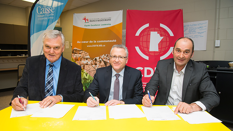 Edmond Labossière, President of CDEM’s Board of Directors, Joël Rondeau, Executive Director of Caisse Financial Group and Bernard Lesage, President of the Commission scolaire franco-manitobaine (CSFM).